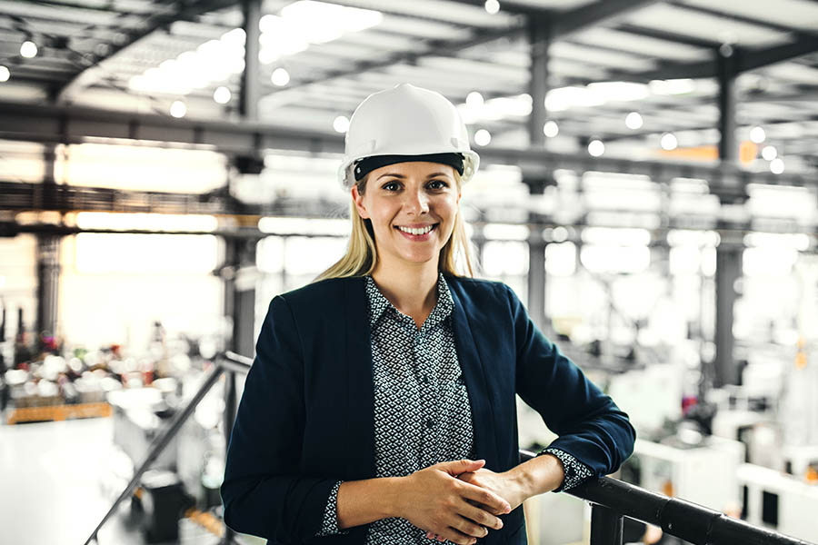 Engineer Insurance - Woman Engineer Working on Site for a New Factory